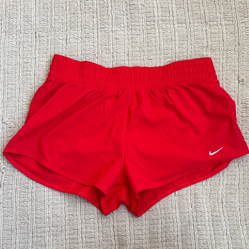 Nike Women’s Red Athletic Running Shorts with White Swoosh